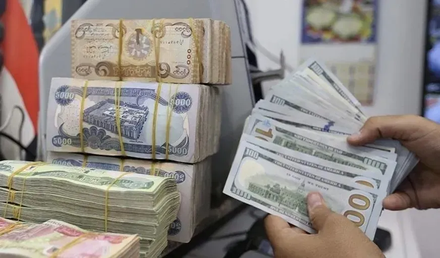 أسعار صرف الدولار تسجل 153,500 دينار في الأسواق المحلية