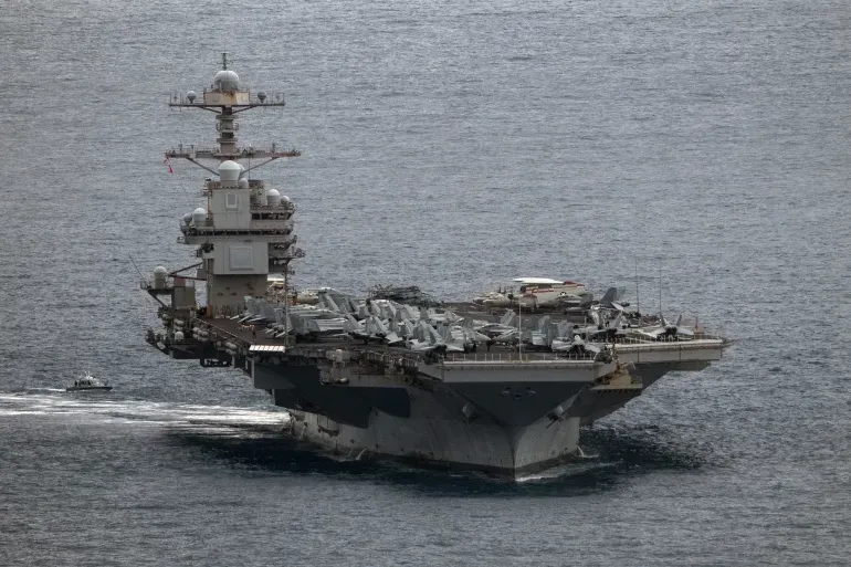 After 326 days sailing largest US aircraft carrier returns its base