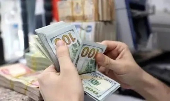 US Dollar Exchange Rate Stabilizes in Iraq at 157,000 Dinars